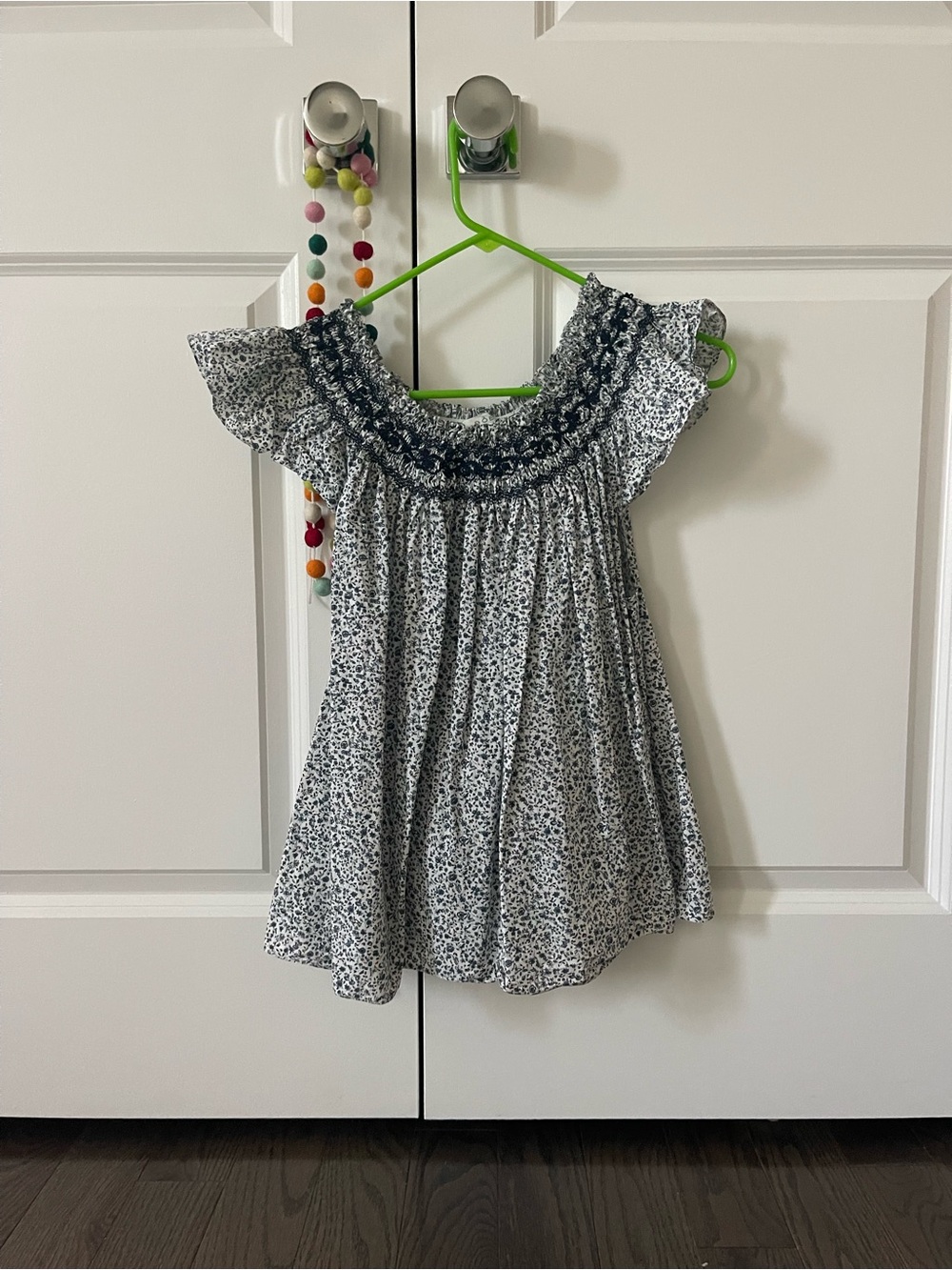 Smocked Flutter Sleeve Floral Sleeveless Top